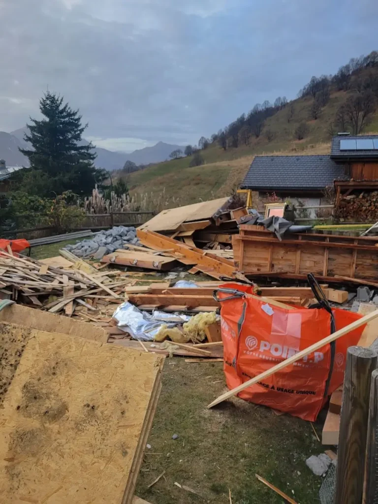 Chalet renovation site with materials and mountain views