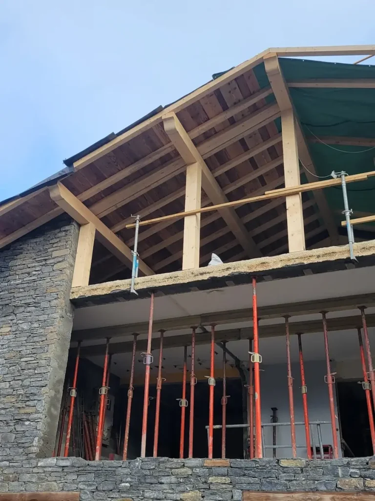 Close-up of timber roof structure during chalet renovation