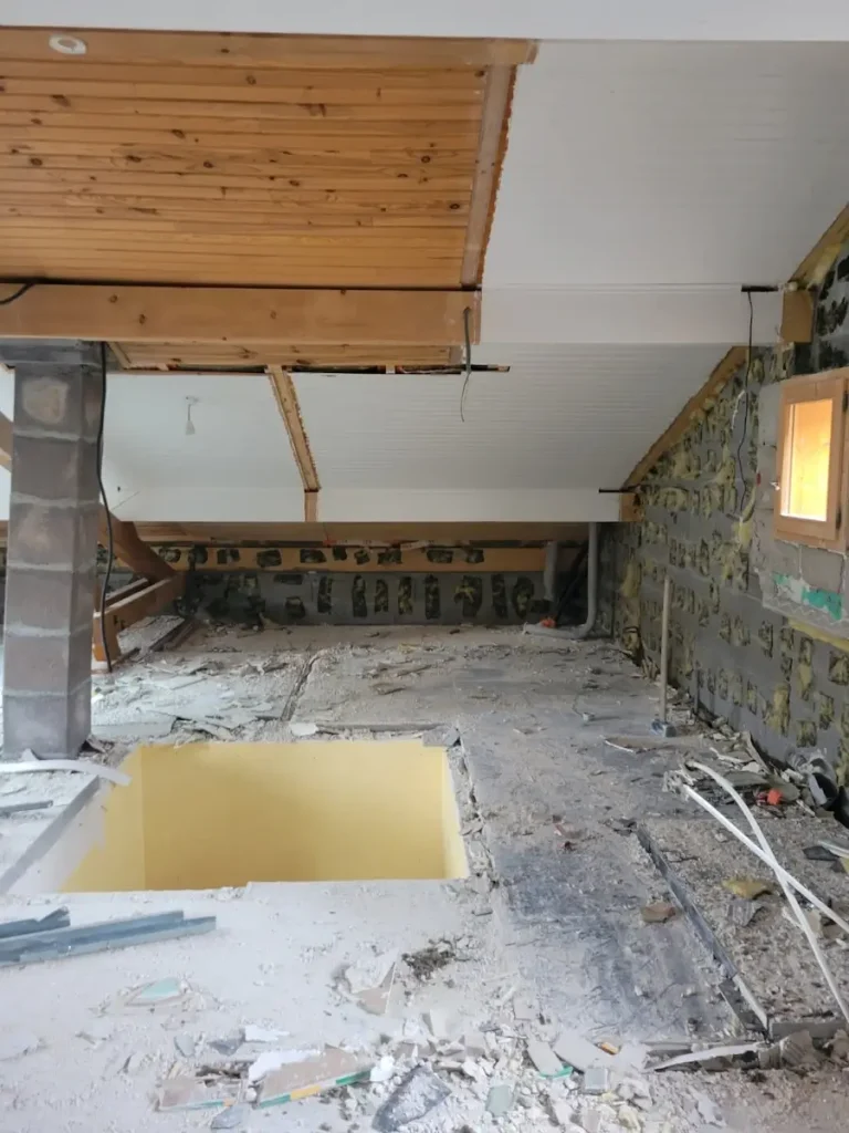 Interior room with timber ceiling during renovation