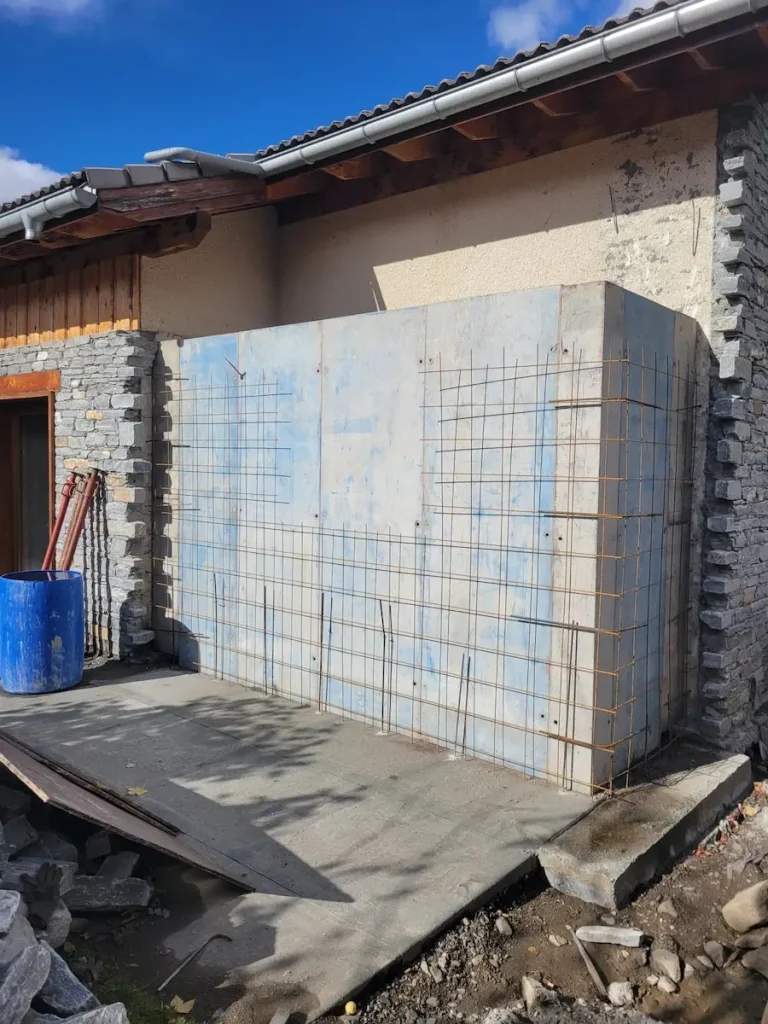 Outside concrete strengthening work during chalet renovation